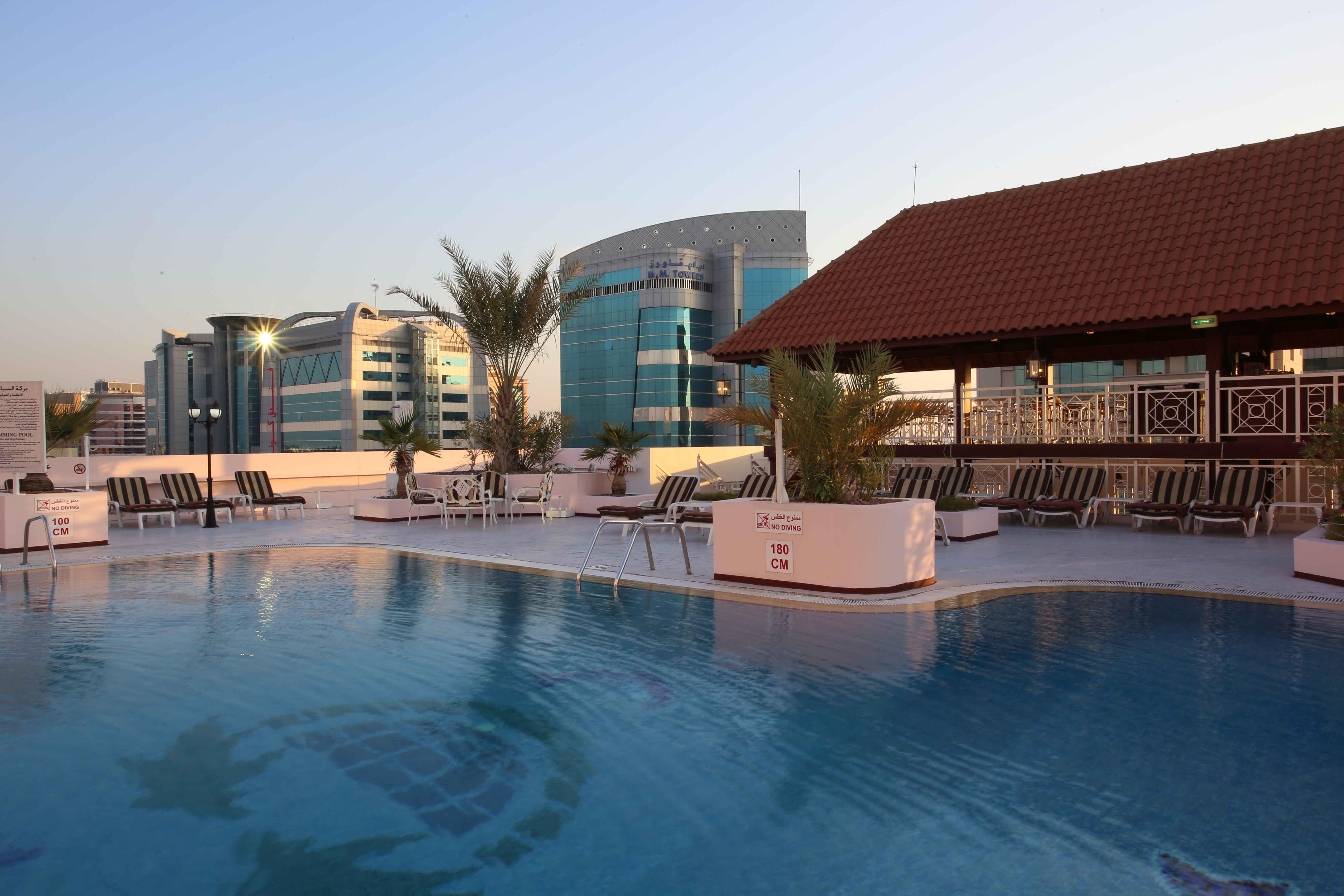Knight Castle Hotel Dubai Exteriör bild Rooftop pool at the hotel