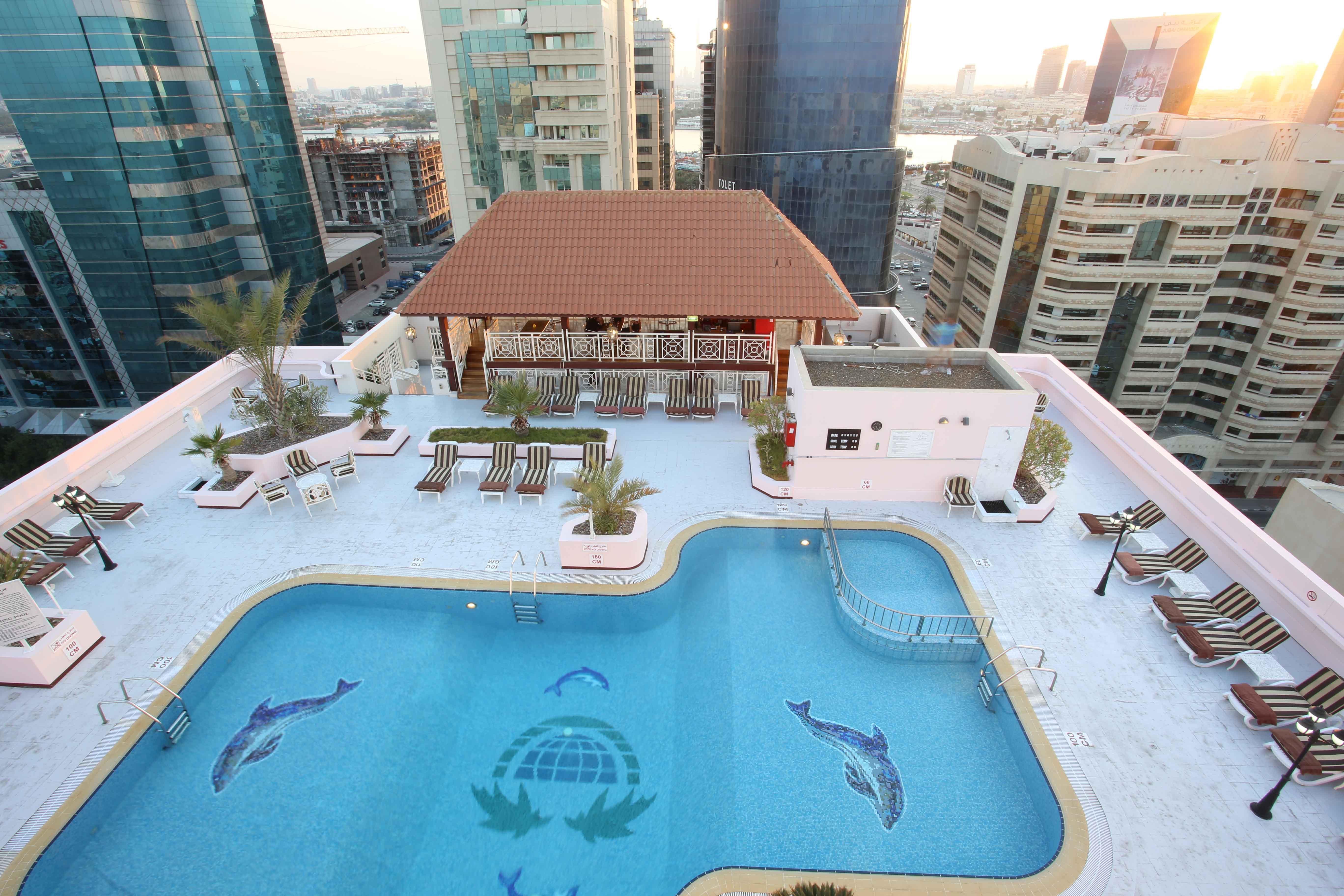 Knight Castle Hotel Dubai Exteriör bild The swimming pool at the hotel