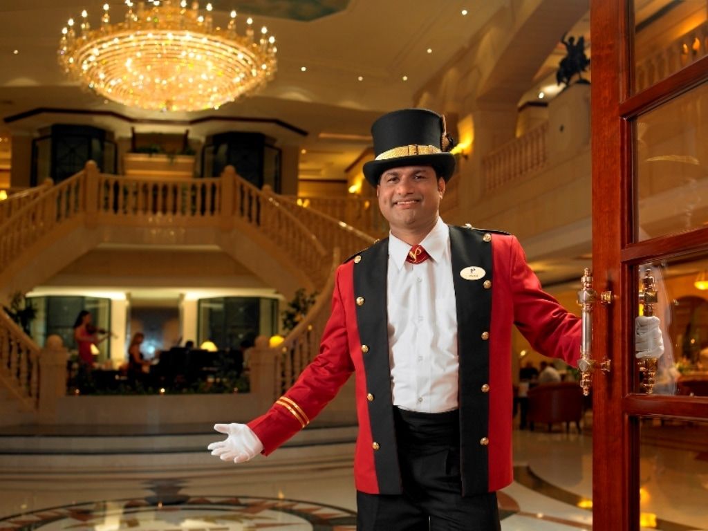 Knight Castle Hotel Dubai Exteriör bild A doorman at the Grand Hyatt Hotel, Mumbai, India