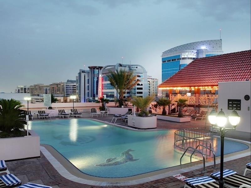 Knight Castle Hotel Dubai Exteriör bild The swimming pool at the hotel